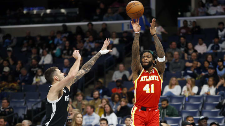 Mar 8, 2024; Memphis, Tennessee, USA; Atlanta Hawks forward Saddiq Bey (41) shoots for three as Memphis Grizzlies guard John Konchar (46) defends during the first half at FedExForum. Mandatory Credit: Petre Thomas-USA TODAY Sports