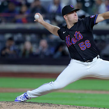 Sep 12, 2025; New York City, New York, USA; New York Mets relief pitcher Ryan Helsley (56) pitches against the Texas Rangers during the ninth inning at Citi Field. Mandatory Credit: Brad Penner-Imagn Images