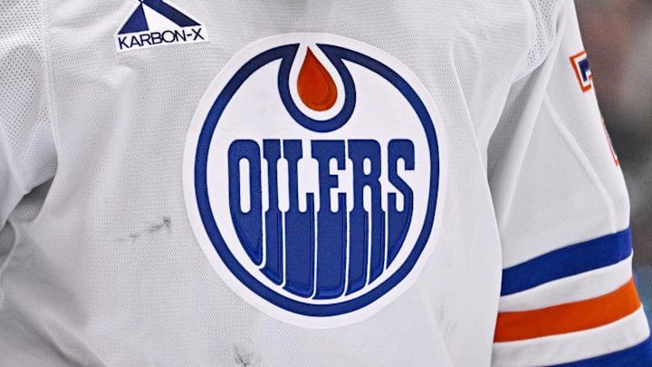 May 29, 2025; Dallas, Texas, USA; A view of the logo of the Edmonton Oilers on the jersey of goaltender Stuart Skinner (74) during the game between the Dallas Stars and the Edmonton Oilers in game five of the Western Conference Final of the 2025 Stanley Cup Playoffs at American Airlines Center. May 29, 2025; Dallas, Texas, USA; A view of the logo of the Edmonton Oilers on the jersey of goaltender Stuart Skinner (74) during the game between the Dallas Stars and the Edmonton Oilers in game five of the Western Conference Final of the 2025 Stanley Cup Playoffs at American Airlines Center.