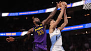 Dec 6, 2024; Atlanta, Georgia, USA; Los Angeles Lakers forward LeBron James (23) blocks the shot of Atlanta Hawks guard Dyson Daniels (5) in overtime at State Farm Arena. Mandatory Credit: Brett Davis-Imagn Images