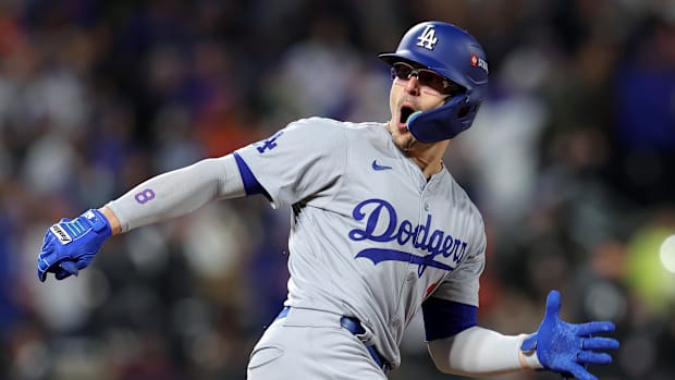 Los Angeles Dodgers third base Enrique Hernandez (8) reacts after hitting a home run in Game 3 of the 2024 NLCS