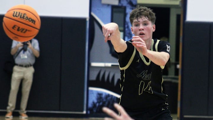 Nease guard Ryan Gornto (14) throws a pass against Ponte Vedra during a high school boys basketball game on December 15, 2023. [Clayton Freeman/Florida Times-Union]