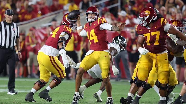 Sep 26, 2026; Los Angeles, California, USA;  USC Trojans quarterback Jayden Maiava (14) prepares to throws a pass against the Oregon Ducks during the fourth quarter at United Airlines Field at Los Angeles Memorial Coliseum.  Mandatory Credit: Kiyoshi Mio-Imagn Images
