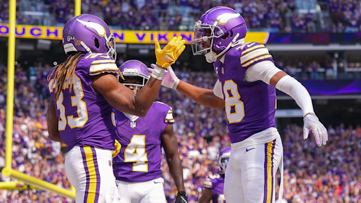 Sep 22, 2024; Minneapolis, Minnesota, USA; Minnesota Vikings running back Aaron Jones (33) celebrates his touchdown with wide receiver Justin Jefferson (18) against the Houston Texans in the first quarter at U.S. Bank Stadium. Sep 22, 2024; Minneapolis, Minnesota, USA; Minnesota Vikings running back Aaron Jones (33) celebrates his touchdown with wide receiver Justin Jefferson (18) against the Houston Texans in the first quarter at U.S. Bank Stadium.