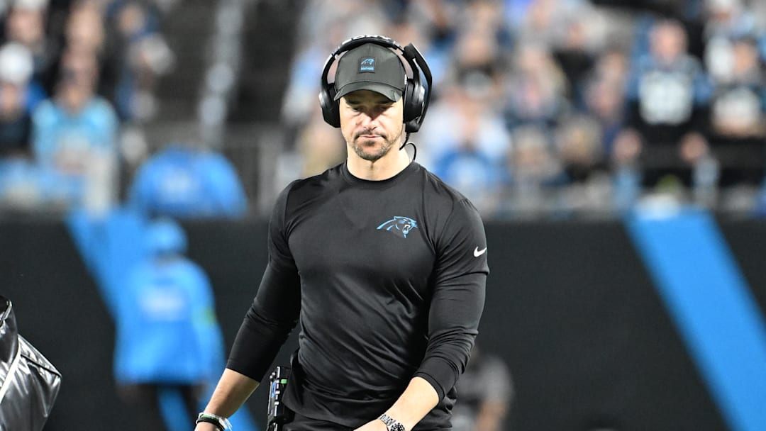 Jan 10, 2026; Charlotte, NC, USA; Carolina Panthers head coach Dave Canales on the field in the second quarter in an NFC Wild Card Round game at Bank of America Stadium. Mandatory Credit: Bob Donnan-Imagn Images