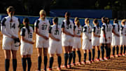 Apr 22, 2008; Los Angeles, CA, USA; USA national team players Monica Abbott (14), Vicky Galindo (19), Jennie Finch (27), Jenny Topping (31), Alicia Hollowell (34), Lauren Lappin (37), Laura Berg (44), Caitlin Lowe (26), Natasha Watley (29) Jessica Mendoza (2) and Crstyl Bustos (6) listen to national anthem before exhibition game against the UCLA Bruins at Easton Field. 