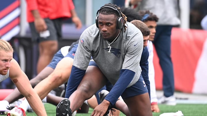 New England Patriots quarterback Joe Milton III warms up before a game against the Carolina Panthers at Gillette Stadium.
