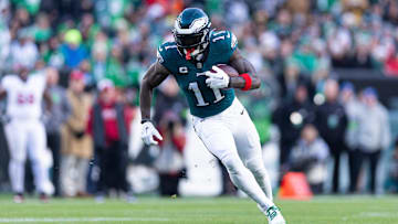 Dec 31, 2023; Philadelphia, Pennsylvania, USA; Philadelphia Eagles wide receiver A.J. Brown (11) runs with the ball during the fourth quarter against the Arizona Cardinals at Lincoln Financial Field. Mandatory Credit: Bill Streicher-USA TODAY Sports