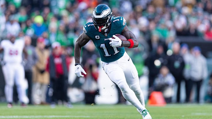 Dec 31, 2023; Philadelphia, Pennsylvania, USA; Philadelphia Eagles wide receiver A.J. Brown (11) runs with the ball during the fourth quarter against the Arizona Cardinals at Lincoln Financial Field. Mandatory Credit: Bill Streicher-USA TODAY Sports