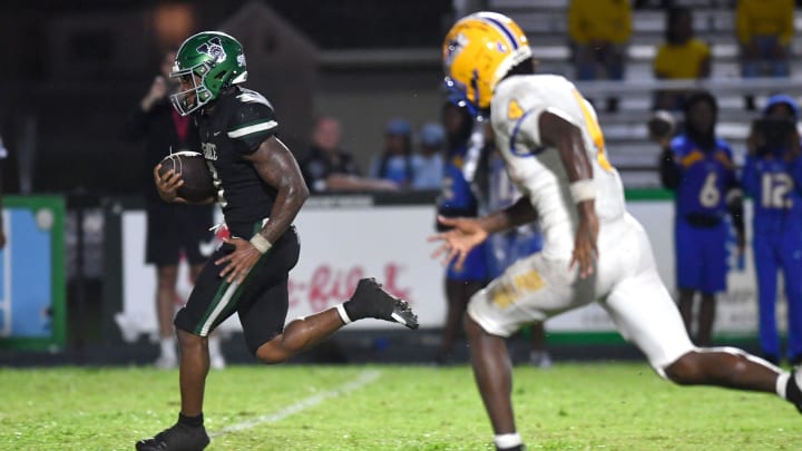 Miami Northwestern defensive back J'Vari Flowers (#4) is unable to catch Venice High running back Jamarice Wilder (#3) on his way to the end zone untouched. The Venice High Indians hosted the Miami Northwestern Bulls in a non-conference game Friday evening, Aug. 30, 2024.