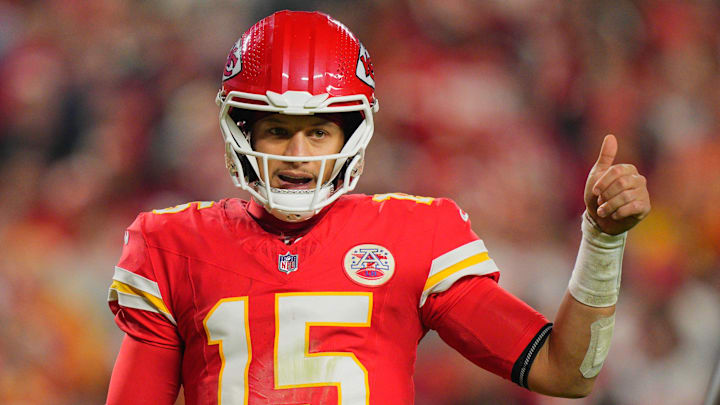 Kansas City Chiefs quarterback Patrick Mahomes (15) reacts during a game against the Washington Commanders.