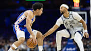 Dec 4, 2024; Philadelphia, Pennsylvania, USA; Philadelphia 76ers guard Jared McCain (20) dribbles the ball against Orlando Magic guard Jalen Suggs (4) during the third quarter at Wells Fargo Center. Mandatory Credit: Bill Streicher-Imagn Images