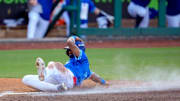 Oklahoma City Comets outfielder Jose Ramos (18) slides home to score a run during a minor league baseball game between the Oklahoma City Comets and the Sugar Land Space Cowboys at Chickasaw Bricktown Ballpark in Oklahoma City on July 9.