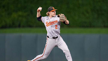 Sep 27, 2024; Minneapolis, Minnesota, USA; Baltimore Orioles shortstop Gunnar Henderson (2) throws out Minnesota Twins shortstop Carlos Correa (4) in the sixth inning at Target Field.