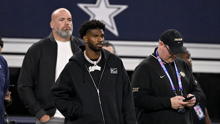 Jan 30, 2025; Arlington, TX, USA; West quarterback Shedeur Sanders of Colorado (2) looks on from the sidelines during the first half against the East at AT&T Stadium. Mandatory Credit: Jerome Miron-Imagn Images Jan 30, 2025; Arlington, TX, USA; West quarterback Shedeur Sanders of Colorado (2) looks on from the sidelines during the first half against the East at AT&T Stadium. Mandatory Credit: Jerome Miron-Imagn Images