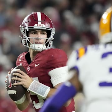 Nov 8, 2025; Tuscaloosa, Alabama, USA;  Alabama quarterback Ty Simpson (15) looks to pass against LSU at Saban Field at Bryant-Denny Stadium. 