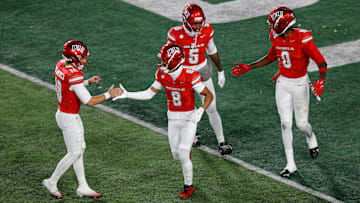 UNLV Rebels wide receiver Taeshaun Lyons (8) celebrates his touchdown with quarterback Anthony Colandrea (10) and wide receiver Koy Moore (5) and wide receiver Troy Omeire (0) in the fourth quarter against the Colorado State Rams at Sonny Lubick Field at Canvas Stadium. Mandatory Credit: Isaiah J. Downing-Imagn Images