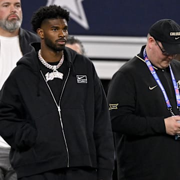 Jan 30, 2025; Arlington, TX, USA; West quarterback Shedeur Sanders of Colorado (2) looks on from the sidelines during the first half against the East at AT&T Stadium. Mandatory Credit: Jerome Miron-Imagn Images