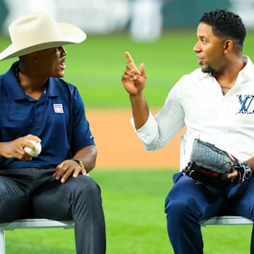 Aug 17, 2024; Arlington, Texas, USA;  Texas Rangers Hall of Fame player Adrian Beltre laughs with former player Elvis Andrus before the game against the Minnesota Twins at Globe Life Field. Mandatory Credit: Kevin Jairaj-Imagn Images