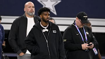West quarterback Shedeur Sanders of Colorado looks on from the sidelines during the first half against the East at AT&T Stadium. 