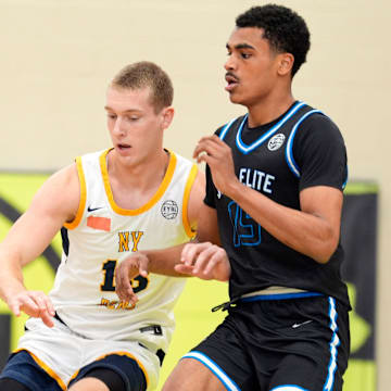 NY Rens Gabriel Hornberger (13) and JL3 Abdul Aziz Olajuwon (15) battle for the ball during the NY Rens and JL3 game in July at the Nike EYBL Peach Jam at Riverview Park Activities Center in North Augusta, South Carolina.