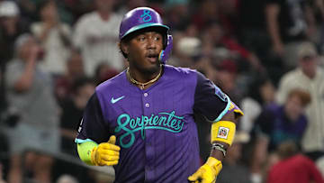 Sep 5, 2025; Phoenix, Arizona, USA; Arizona Diamondbacks shortstop Geraldo Perdomo (2) reacts after hitting a solo home run against the Boston Red Sox in the first inning at Chase Field. Mandatory Credit: Rick Scuteri-Imagn Images