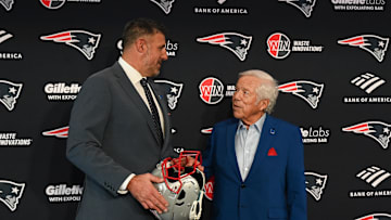 Jan 13, 2025; Foxborough, MA, USA; Mike Vrabel (left) poses for a photo with New England Patriots owner Robert Kraft (right) after a press conference at Gillette Stadium to introduce him as the Patriots new head coach. Mandatory Credit: Eric Canha-Imagn Images