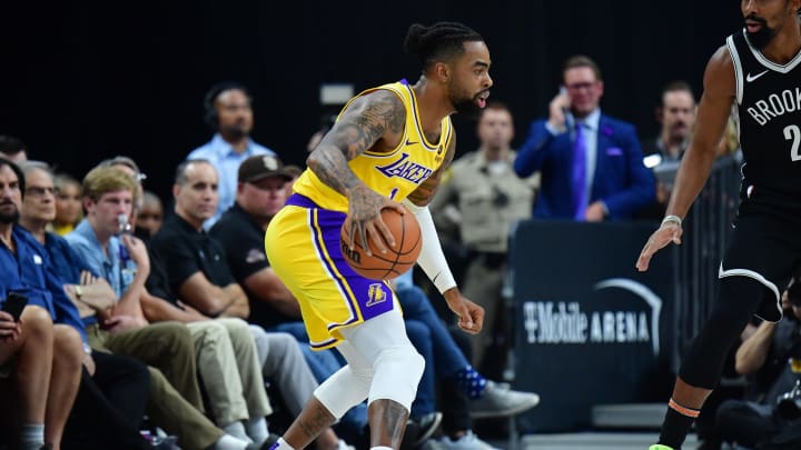 Oct 9, 2023; Las Vegas, Nevada, USA; Los Angeles Lakers guard D'Angelo Russell (1) controls the ball against the Brooklyn Nets during the first half at T-Mobile Arena. Mandatory Credit: Gary A. Vasquez-USA TODAY Sports