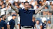 Former Penn State strength coach Chuck Losey gives instructions before a Nittany Lions game at Beaver Stadium. 