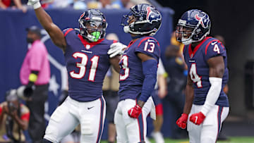 Former Houston Texans wide receiver Brandin Cooks (13) celebrates with wide receiver Phillip Dorsett (4) and Houston Texans running back Dameon Pierce (31) after scoring a touchdown at NRG Stadium. 