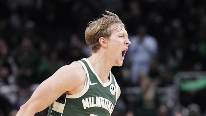Milwaukee Bucks guard AJ Green (20) yells out during a timeout after a made three-point shot against the Detroit Pistons at Fiserv Forum on December 3, 2025.