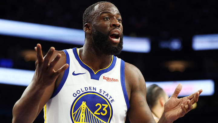 Dec 18, 2025; Phoenix, Arizona, USA; Golden State Warriors forward Draymond Green (23) reacts against the Phoenix Suns at Mortgage Matchup Center. Mandatory Credit: Mark J. Rebilas-Imagn Images