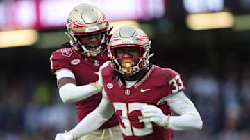 Aug 24, 2024; Dublin, IRL; Florida State University defensive back Edwin Joseph celebrates a tackle against Georgia Tech with defensive back Conrad Hussey at Aviva Stadium. Mandatory Credit: Tom Maher/INPHO via Imagn Images
