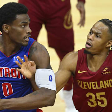 Jan 31, 2024; Cleveland, Ohio, USA; Cleveland Cavaliers forward Isaac Okoro (35) defends against Detroit Pistons center Jalen Duren (0) in the fourth quarter at Rocket Mortgage FieldHouse. Mandatory Credit: David Richard-Imagn Images