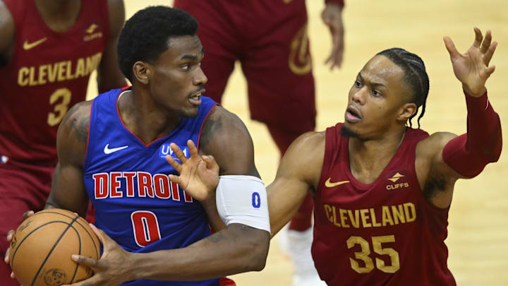 Jan 31, 2024; Cleveland, Ohio, USA; Cleveland Cavaliers forward Isaac Okoro (35) defends against Detroit Pistons center Jalen Duren (0) in the fourth quarter at Rocket Mortgage FieldHouse. Mandatory Credit: David Richard-Imagn Images