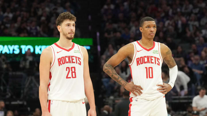 Mar 10, 2024; Sacramento, California, USA; Houston Rockets center Alperen Sengun (28) and forward Jabari Smith Jr. (10) stand on the court during the third quarter against the Sacramento Kings at Golden 1 Center. Mandatory Credit: Darren Yamashita-USA TODAY Sports