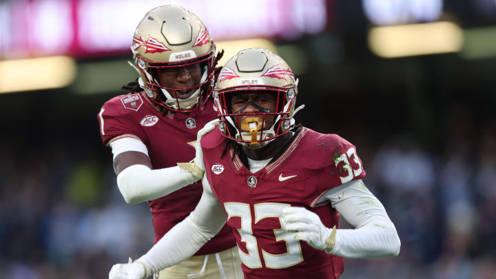 Aug 24, 2024; Dublin, IRL; Florida State University defensive back Edwin Joseph celebrates a tackle against Georgia Tech with defensive back Conrad Hussey at Aviva Stadium. Mandatory Credit: Tom Maher/INPHO via USA TODAY Sports