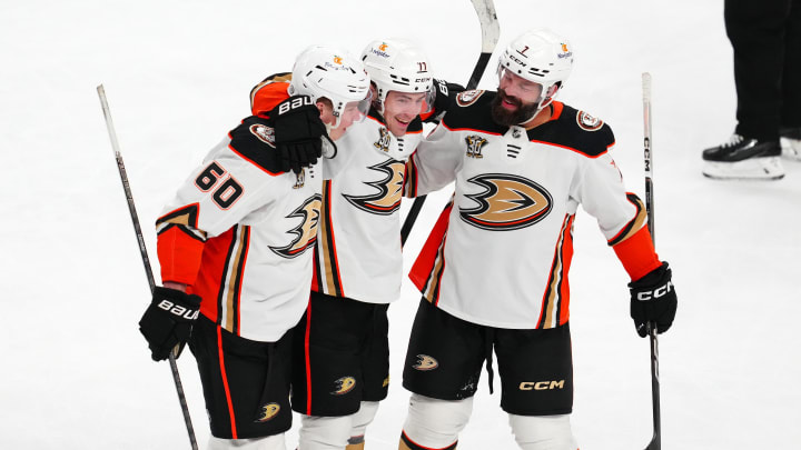 Apr 18, 2024; Las Vegas, Nevada, USA; Anaheim Ducks right wing Frank Vatrano (77) celebrates with defenseman Jackson LaCombe (60) and defenseman Radko Gudas (7) after scoring a third goal against the Vegas Golden Knights during the third period at T-Mobile Arena. Mandatory Credit: Stephen R. Sylvanie-USA TODAY Sports