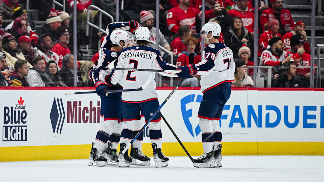 Feb 27, 2025; Detroit, Michigan, USA; Columbus Blue Jackets center Sean Kuraly (7) celebrates his goal with teammates during the second period against the Detroit Red Wings at Little Caesars Arena. Mandatory Credit: Tim Fuller-Imagn Images