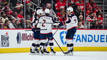 Feb 27, 2025; Detroit, Michigan, USA; Columbus Blue Jackets center Sean Kuraly (7) celebrates his goal with teammates during the second period against the Detroit Red Wings at Little Caesars Arena. Mandatory Credit: Tim Fuller-Imagn Images