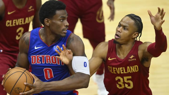 Jan 31, 2024; Cleveland, Ohio, USA; Cleveland Cavaliers forward Isaac Okoro (35) defends against Detroit Pistons center Jalen Duren (0) in the fourth quarter at Rocket Mortgage FieldHouse. Mandatory Credit: David Richard-USA TODAY Sports