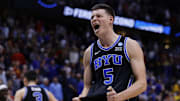 Mar 22, 2025; Denver, CO, USA; Brigham Young Cougars forward Mihailo Boskovic (5) reacts after defeating the Wisconsin Badgers in the second round of the NCAA Tournament  at Ball Arena. Mandatory Credit: Isaiah J. Downing-Imagn Images