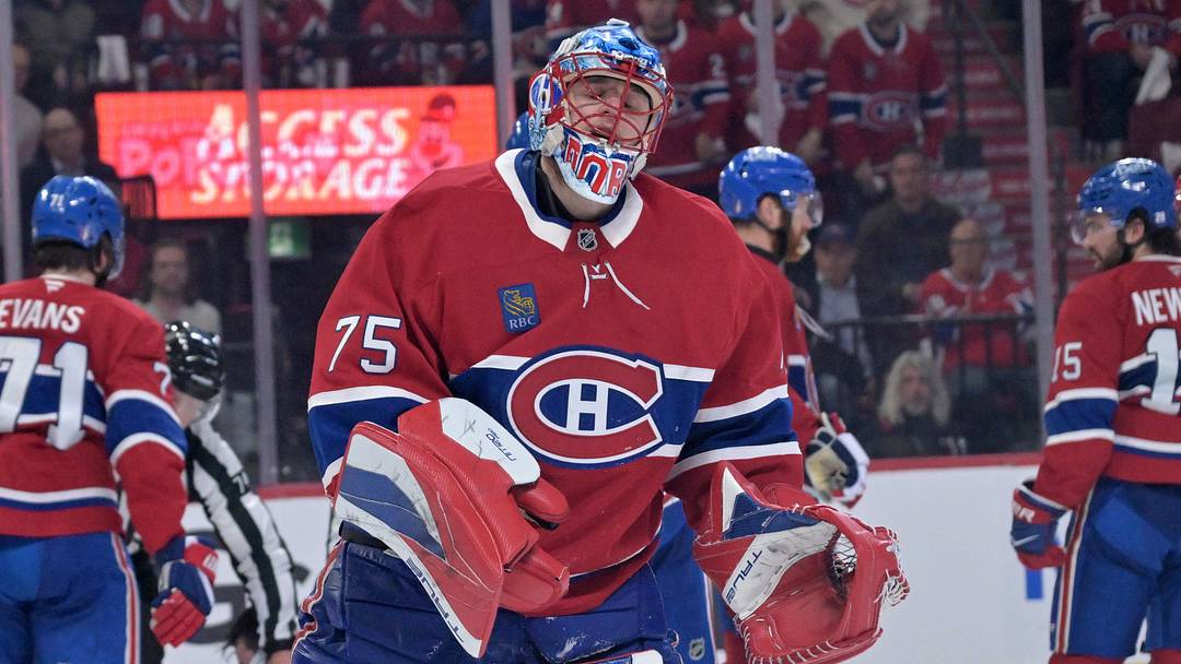 May 25, 2026; Montreal, Quebec, CAN; Montreal Canadiens goaltender Jakub Dobes (75) reacts after a collision during the second period against the Carolina Hurricanes in game three of the Eastern Conference Final of the 2026 Stanley Cup Playoffs at Bell Centre. Mandatory Credit: Eric Bolte-Imagn Images