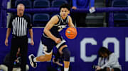 Feb 4, 2025; Colorado Springs, Colorado, USA; Nevada Wolf Pack guard Kobe Sanders (8) controls the ball in the second half against the Air Force Falcons at Clune Arena. Mandatory Credit: Isaiah J. Downing-Imagn Images