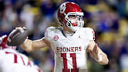 Nov 30, 2024; Baton Rouge, Louisiana, USA;  Oklahoma Sooners quarterback Jackson Arnold (11) passes against the LSU Tigers during the fourth quarter at Tiger Stadium. Mandatory Credit: Stephen Lew-Imagn Images