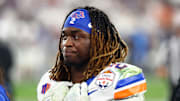 Boise State running back Ashton Jeanty stands on the sidelines.