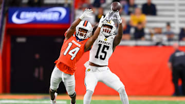 Sep 9, 2023; Syracuse, New York, USA; Syracuse Orange defensive back Jeremiah Wilson (14) breaks up a pass intended for Western Michigan Broncos wide receiver Leroy Thomas (15) during the second half at the JMA Wireless Dome. Mandatory Credit: Rich Barnes-Imagn Images