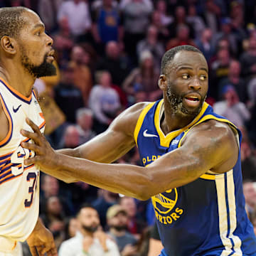 Golden State Warriors forward Draymond Green (23) defends against Phoenix Suns forward Kevin Durant (35) during the fourth quarter at Chase Center. 
