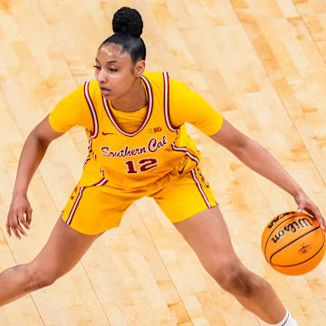 USC Trojans guard JuJu Watkins (12) runs a play Saturday, March 8, 2025, in a semifinals game at the 2025 TIAA Big Ten Women's Basketball Tournament between the Iowa Hawkeyes and the Ohio State Buckeyes at Gainbridge Fieldhouse in Indianapolis.