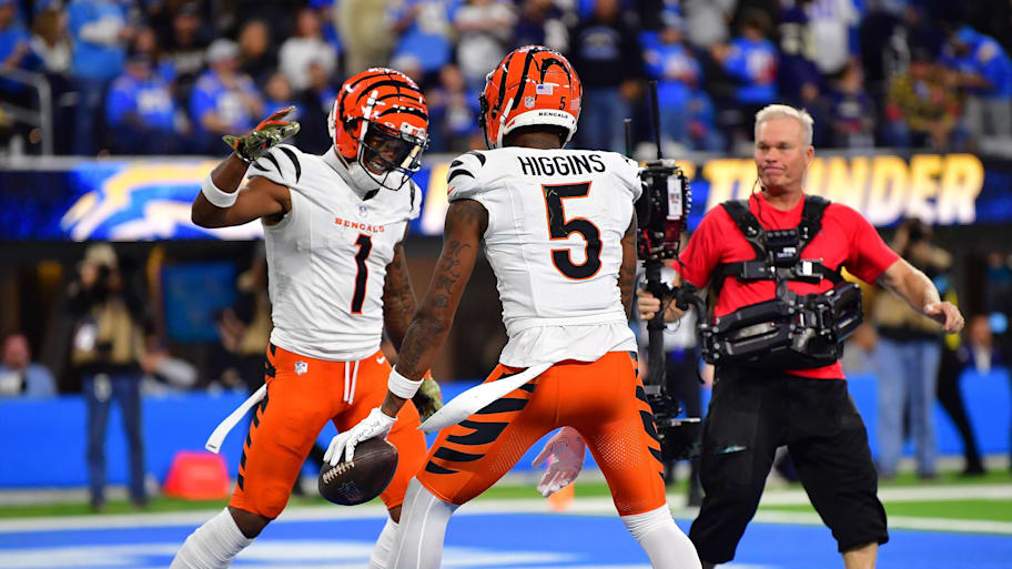 Nov 17, 2024; Inglewood, California, USA; Cincinnati Bengals wide receiver Tee Higgins (5) celebrates his touchdown scored against the Los Angeles Chargers with wide receiver Ja'Marr Chase (1) and running back Chase Brown (30) during the second half at SoFi Stadium. Mandatory Credit: Gary A. Vasquez-Imagn Images | Gary A. Vasquez-Imagn Images